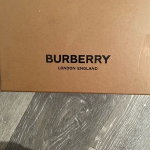 Burberry infant shoes.